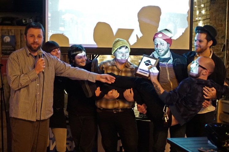 Members of Red Mountain accept the PDD Award for Perfect Album of 2014 at the Red Herring Lounge. (Photo by Steve Ash)