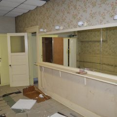 The entrance to the women's restroom in the lower level social hall.