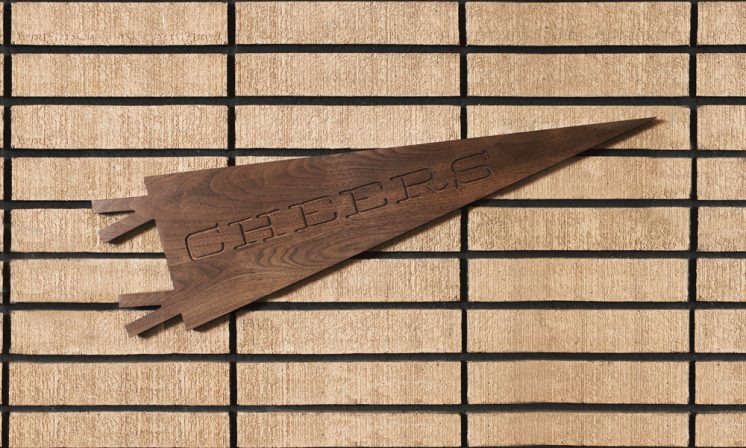 Custom walnut pennant carving.